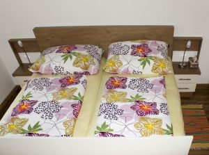  Holzbett aus Melk – Schlafkomfort mit Charakter